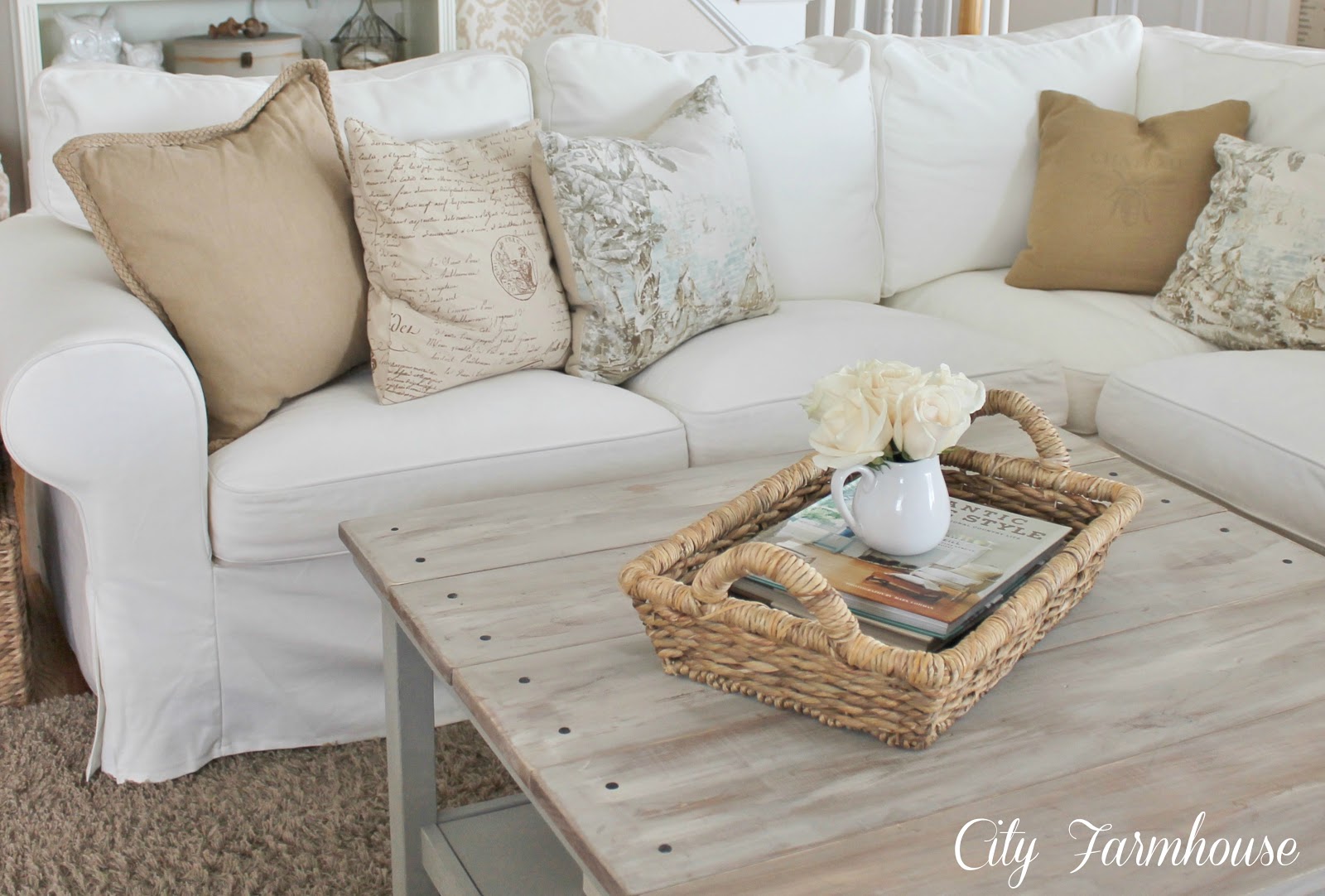 White slipcovered couch deals